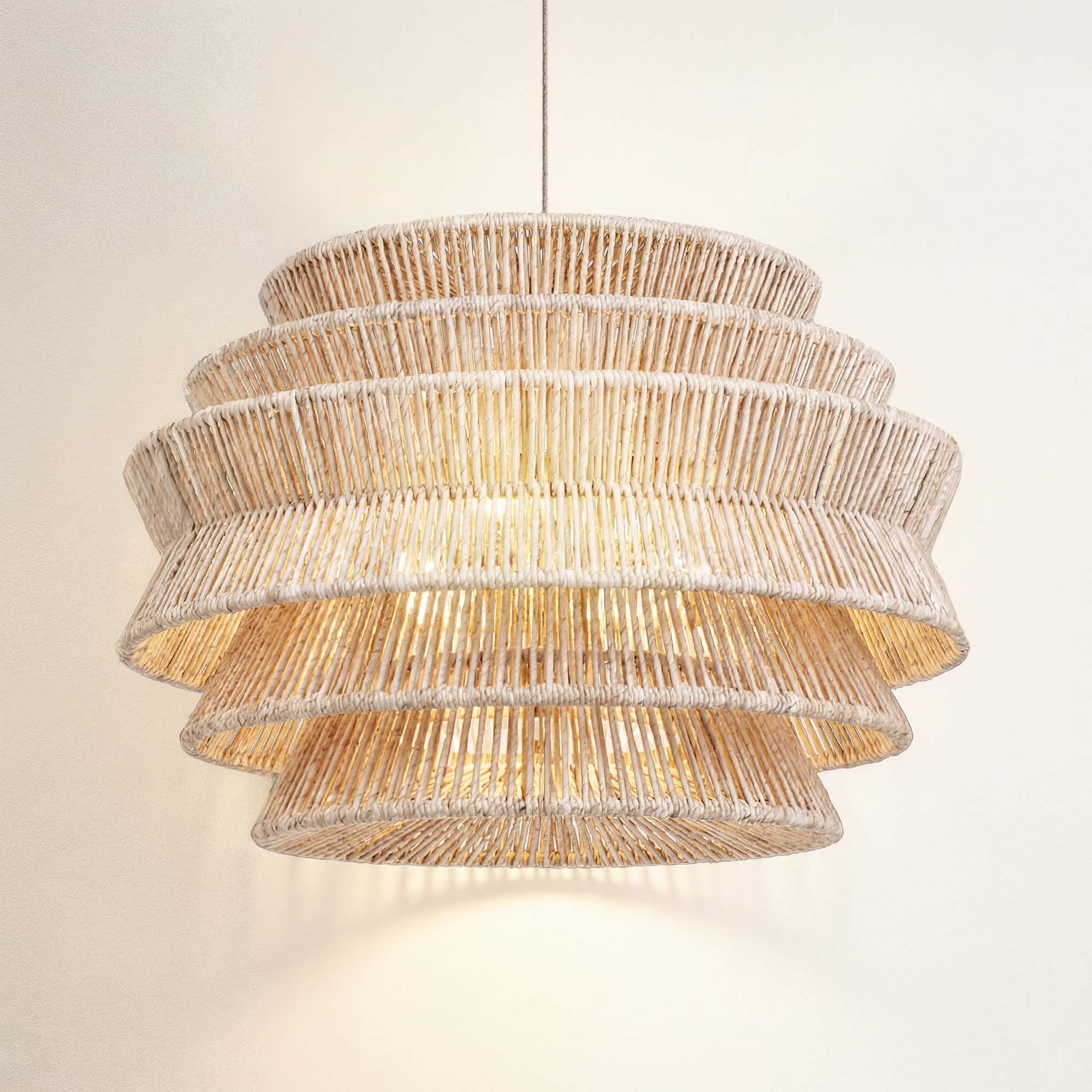 cover veronica rattan pandent light woven light with multiple tiers, on