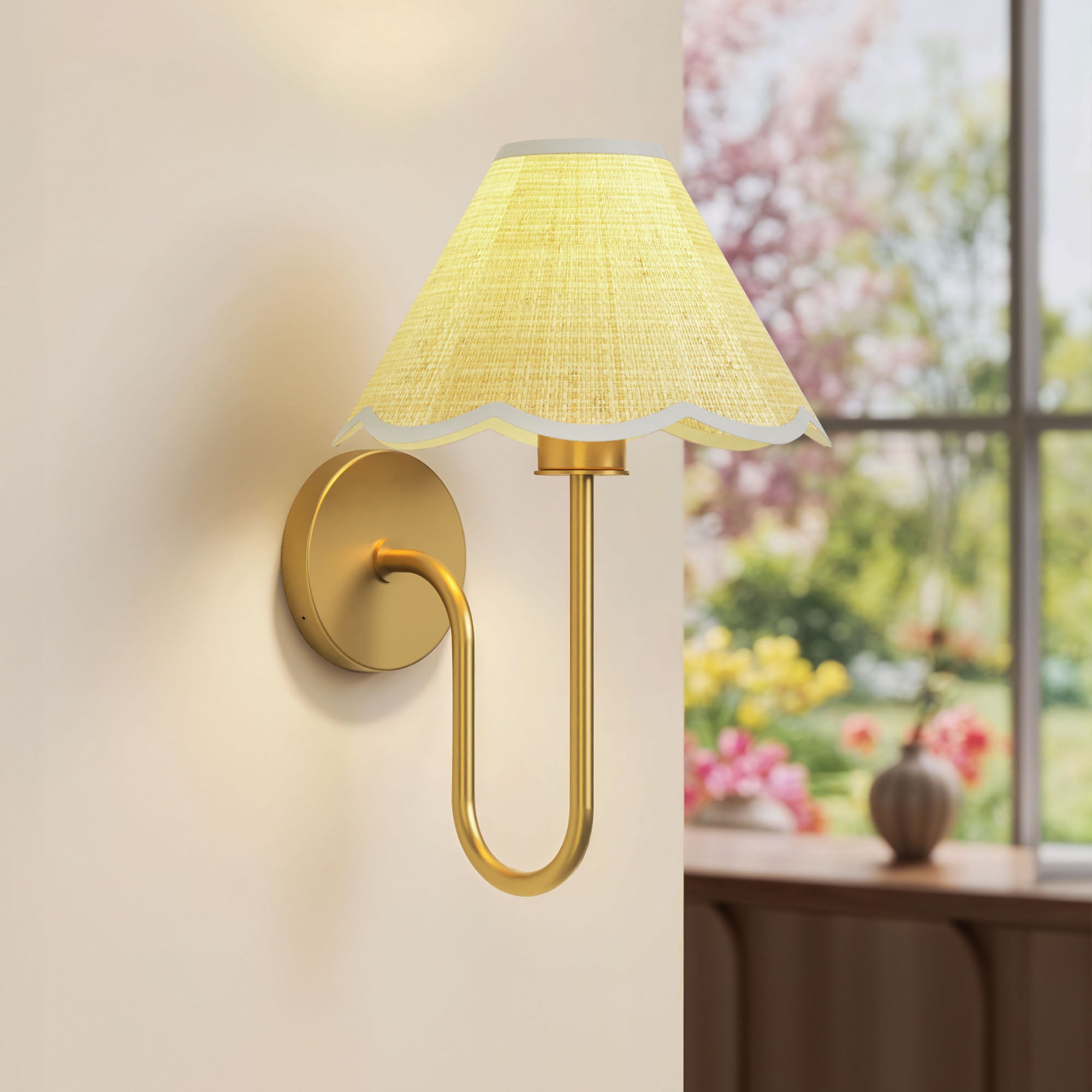 lyra rattan sconce focus with a yellow shade in a room with a window