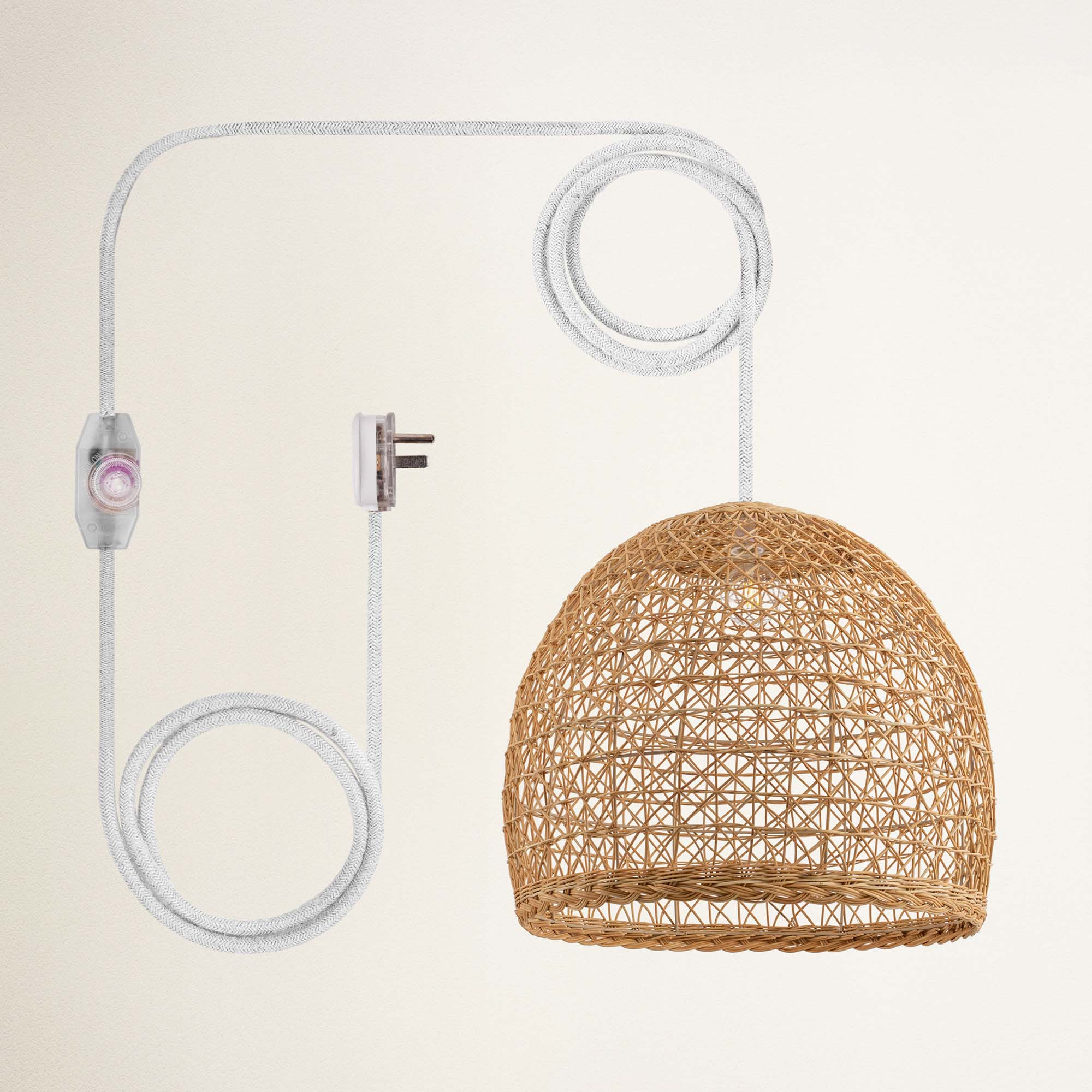 rowabi lumiere plug in white wicker chair with a hanging light fixture