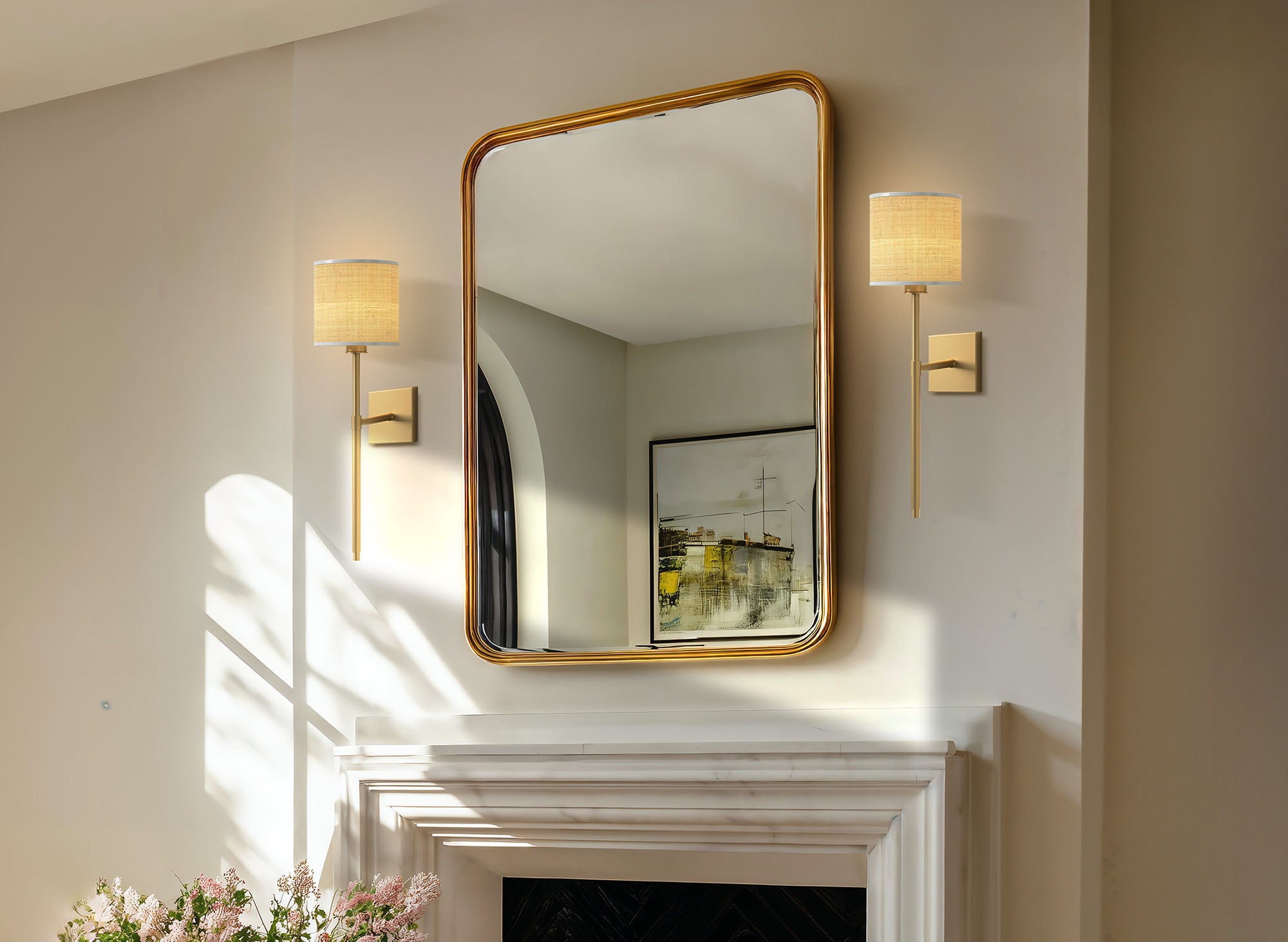 pc spring luma rattan sconce living room with gold-framed mirror and two wall lights