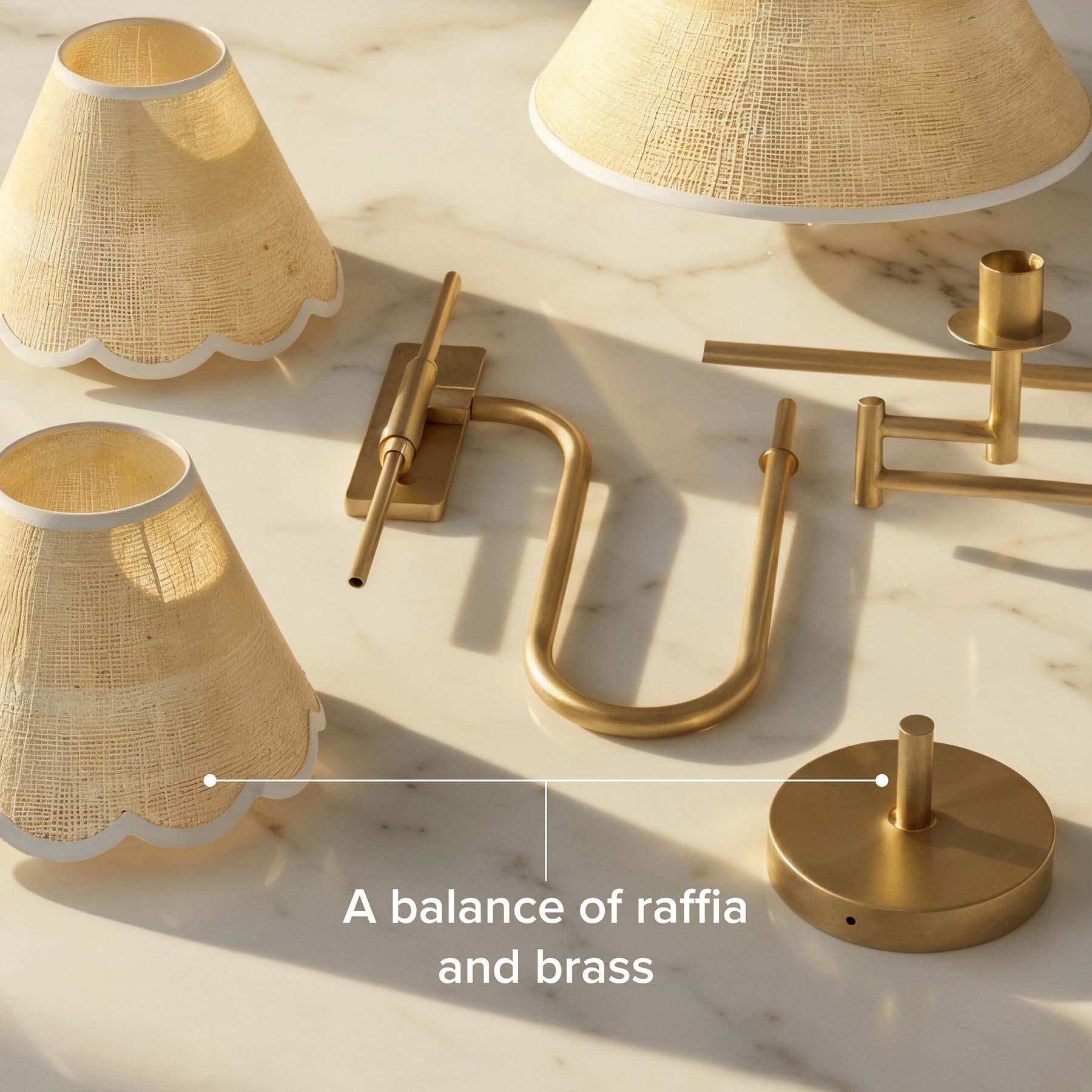 a balance of raffia and brass gold lamp fixtures