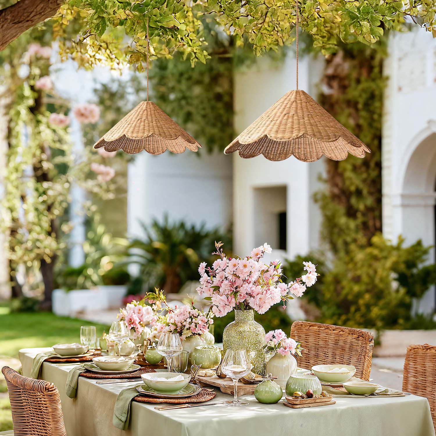 outdoor daisy rattan pendant light dining table set with floral arrangements and wicker chairs