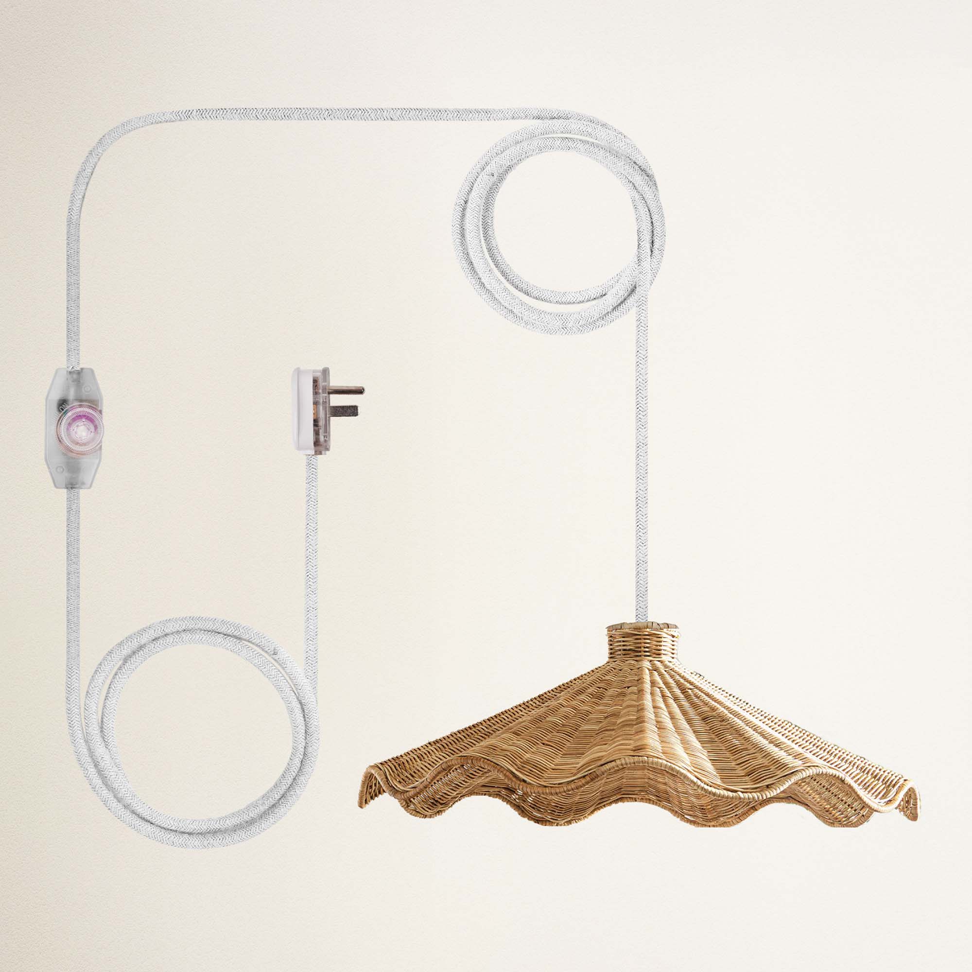 rowabi ariel plug-in white wicker lampshade with a white cord and plug