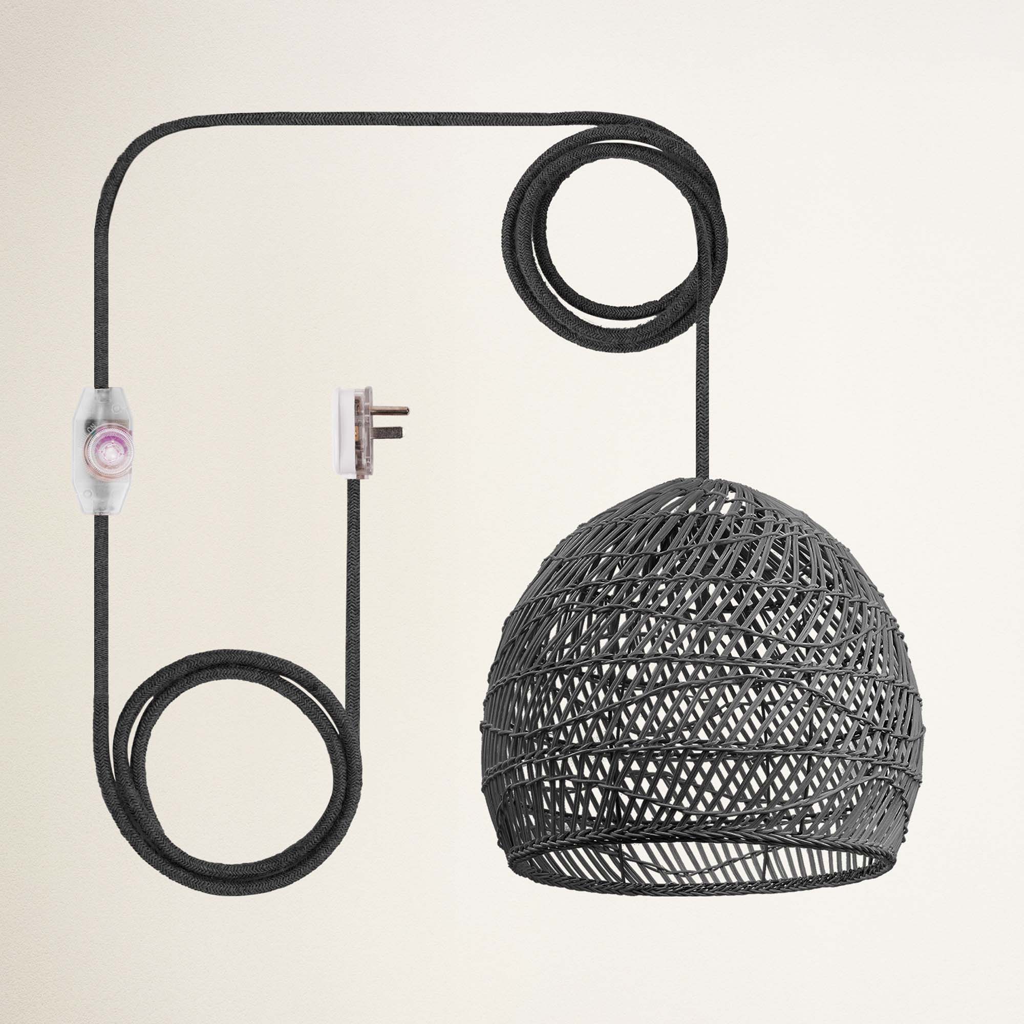 rowabi lunar plug in black lampshade with black metal stand and coiled cable